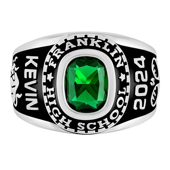 A class ring with a green gemstone, engraved with \“Kevin,\“ \“Franklin High School,\“ and the year \“2024.\“