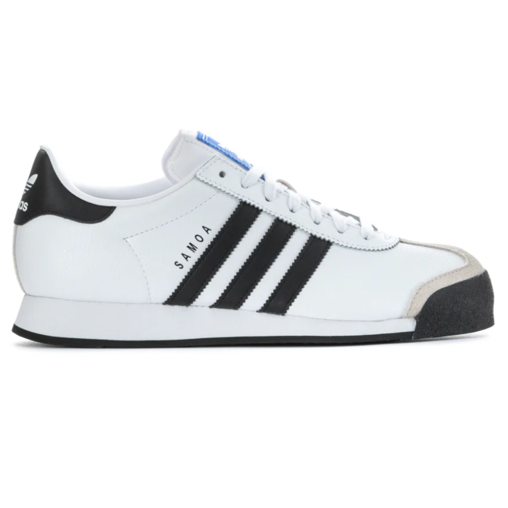 Adidas Samoa sneaker in white with black stripes, featuring a rubber toe and suede accents.