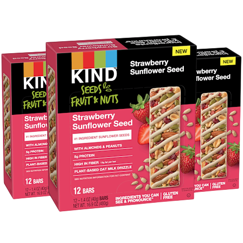 KIND Seeds Fruit & Nuts bars in Strawberry Sunflower Seed flavor, featuring almonds, peanuts, and a plant-based oat milk drizzle. Each box contains 12 bars with high fiber and 5g protein, gluten-free.