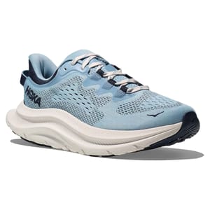 Hoka Women's Kawana 2 Shoes feature a light blue mesh upper with enhanced breathability, a cushioned midsole for comfort, and dark blue accents. The outsole is designed for traction and durability.