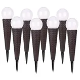 Eight solar garden lights with cone-shaped bases resembling waffle cones and spherical tops.