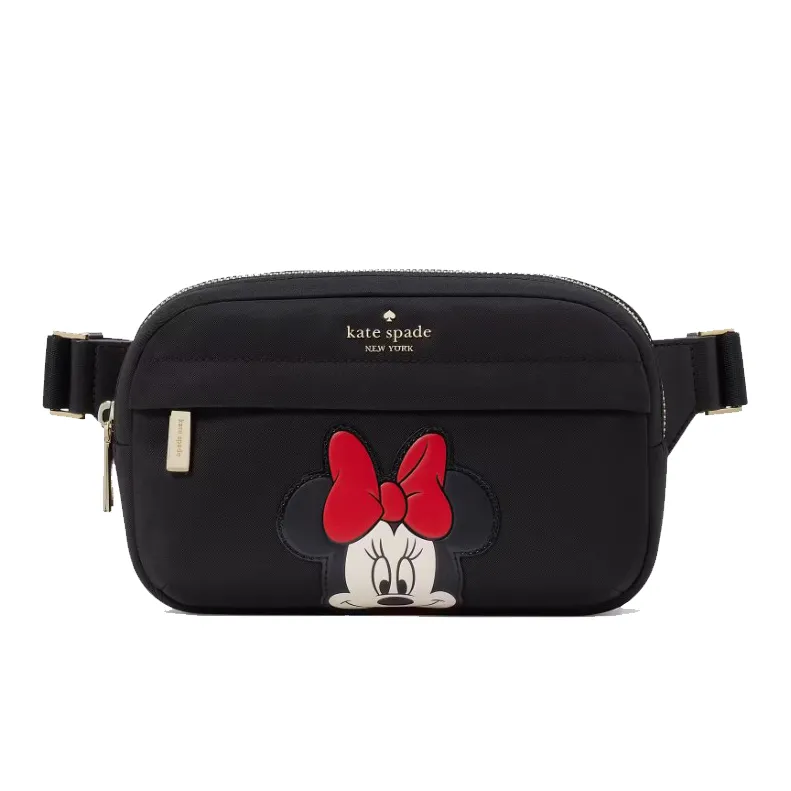 A black Kate Spade belt bag featuring a red-bowed cartoon character on the front, with gold hardware and adjustable strap.
