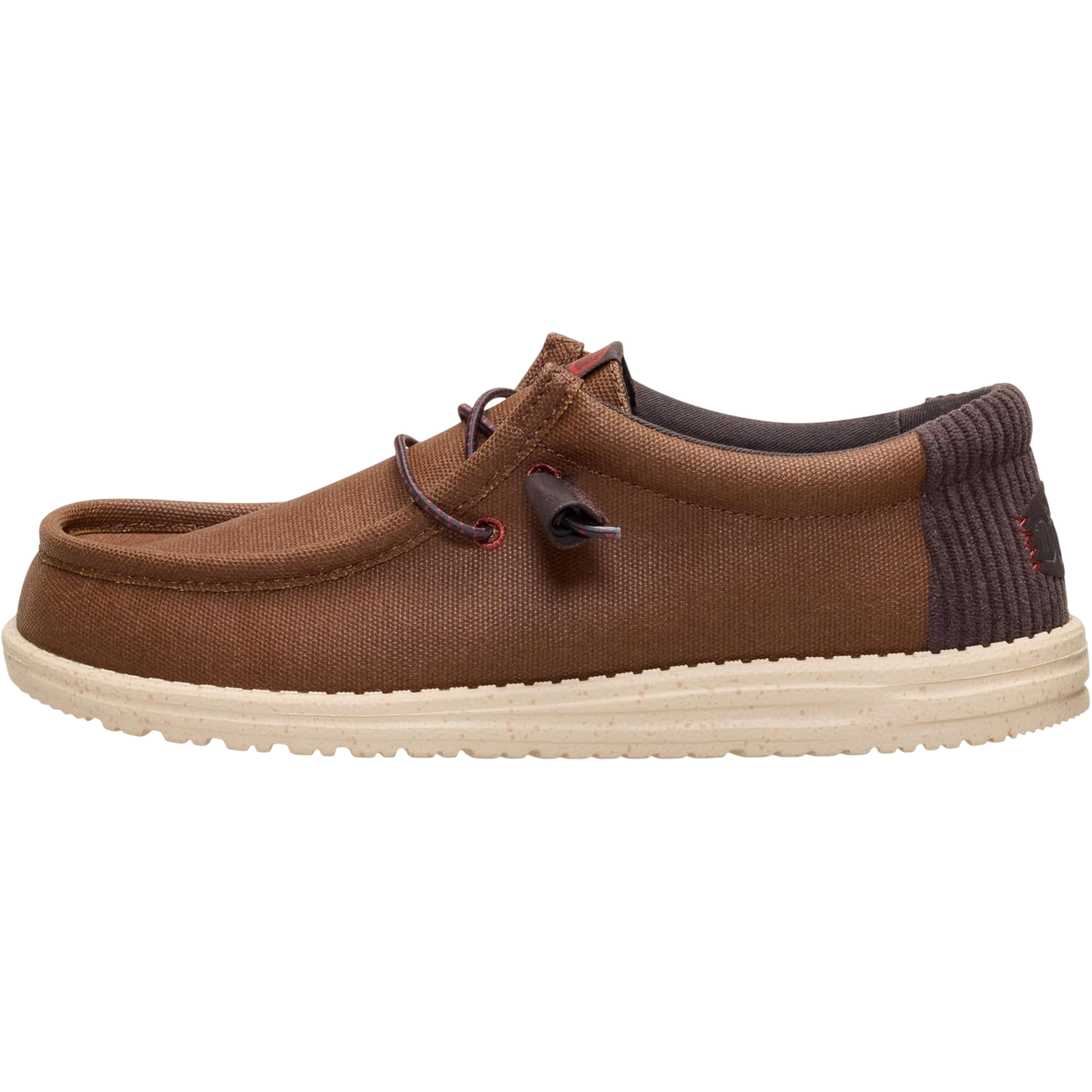 Brown casual slip-on shoe with a canvas upper, round toe, rope-style laces, padded collar, and a cream rubber sole.
