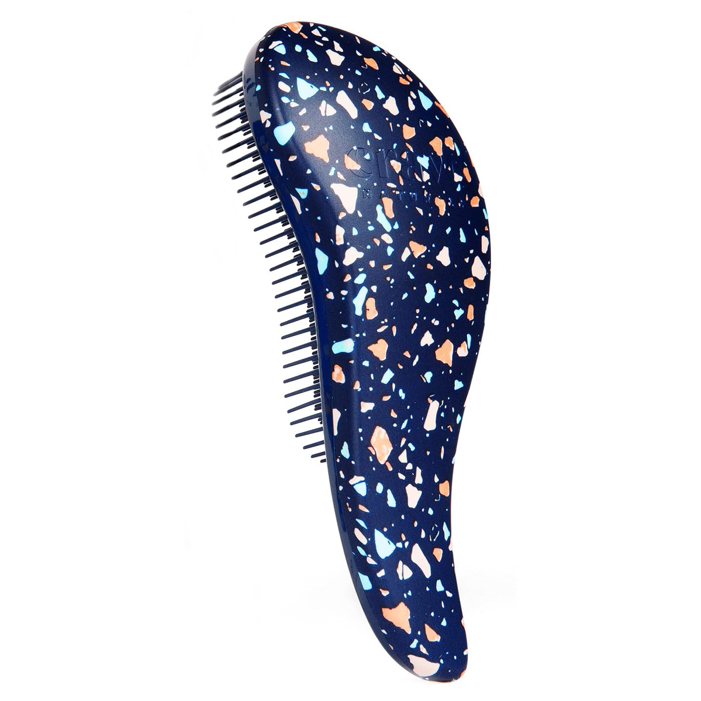 A navy detangling hairbrush features a terrazzo pattern with orange, blue, and white speckles, combined with flexible bristles designed for easy detangling.