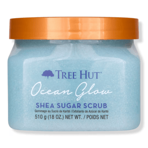 Tree Hut Ocean Glow Shea Sugar Scrub with an orange lid, 510g (18 oz).