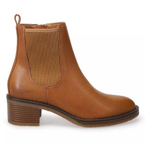 Brown ankle-high Chelsea boots with elastic side panels, pull-tab at the back, and a stacked low block heel. The boots have a smooth leather finish.