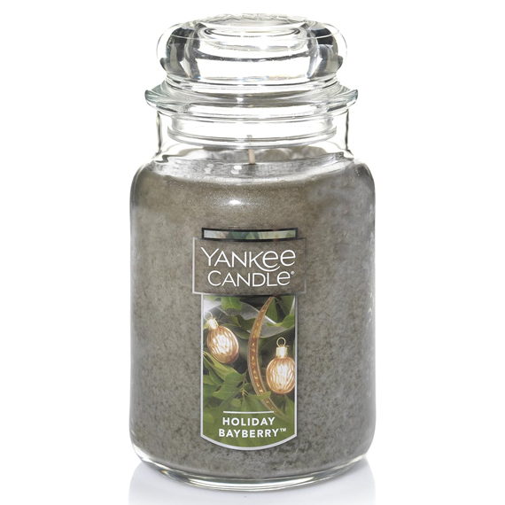 Yankee Candle Holiday Bayberry is a large jar candle with a green hue, featuring a festive scent blend. The label shows holiday-themed greenery and ornaments.