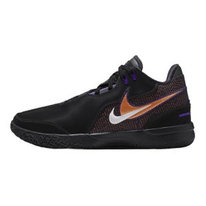 The Nike LeBron NXXT Gen Shoes feature a sleek black design with a distinct orange and white swoosh, enhanced by purple accents. The shoe is designed for basketball, with a textured rubber sole for grip.