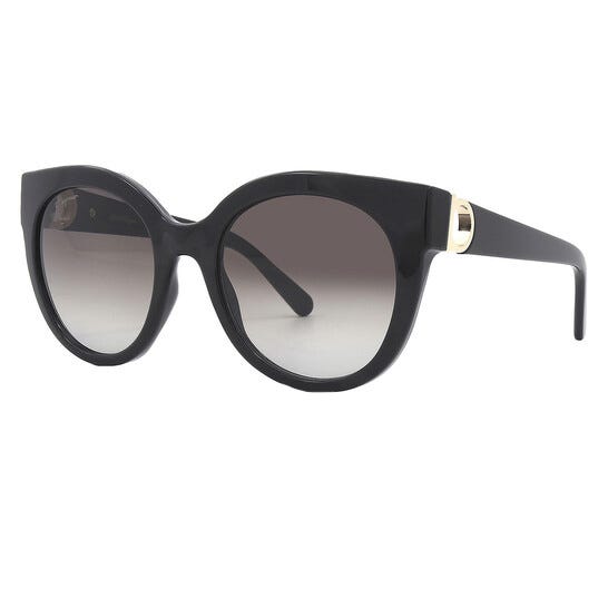 A pair of oversized black sunglasses with a round frame and gradient lenses, featuring gold accents on the arms.