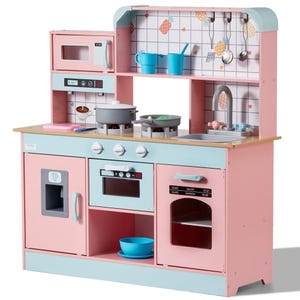 A colorful kids' kitchen playset with a stove, oven, microwave, sink, and utensils. Features pastel pink and blue colors with interactive knobs and accessories like pots and cups. Ideal for imaginative play.