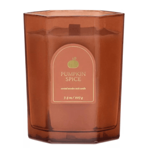 A hexagonal brown jar featuring a \“Pumpkin Spice\“ scented wooden wick candle, weighing 7.3 oz (207 g).