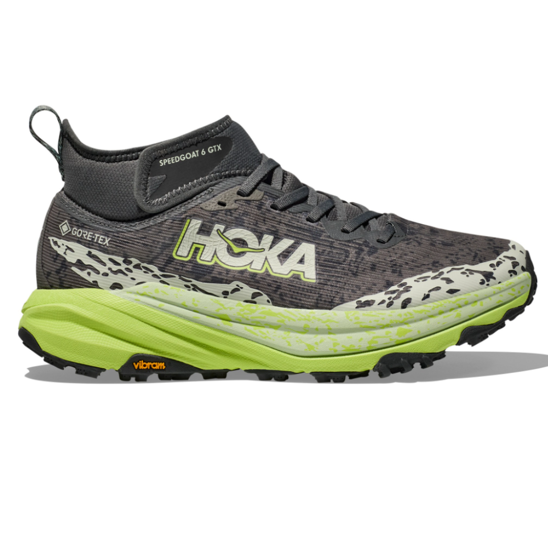 Hoka Speedgoat 6 GTX shoe in gray with a green sole, featuring GORE-TEX for waterproofing and Vibram sole for enhanced traction.