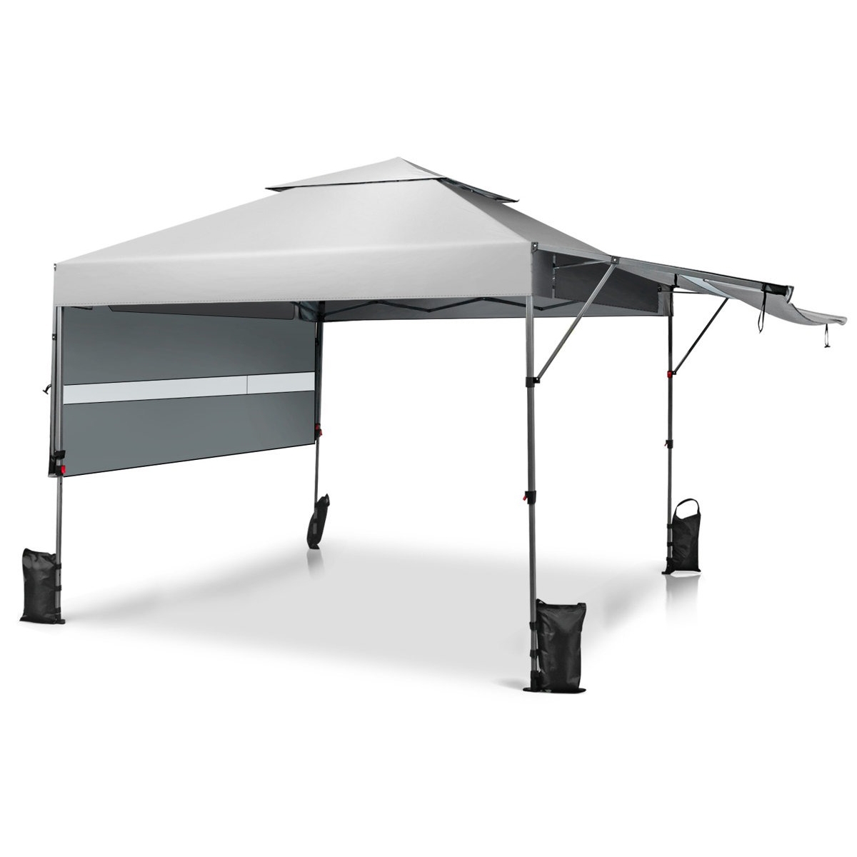A gray pop-up canopy tent with a slanted roof and extended awning, featuring a sidewall and weighted bags at each leg for stability.
