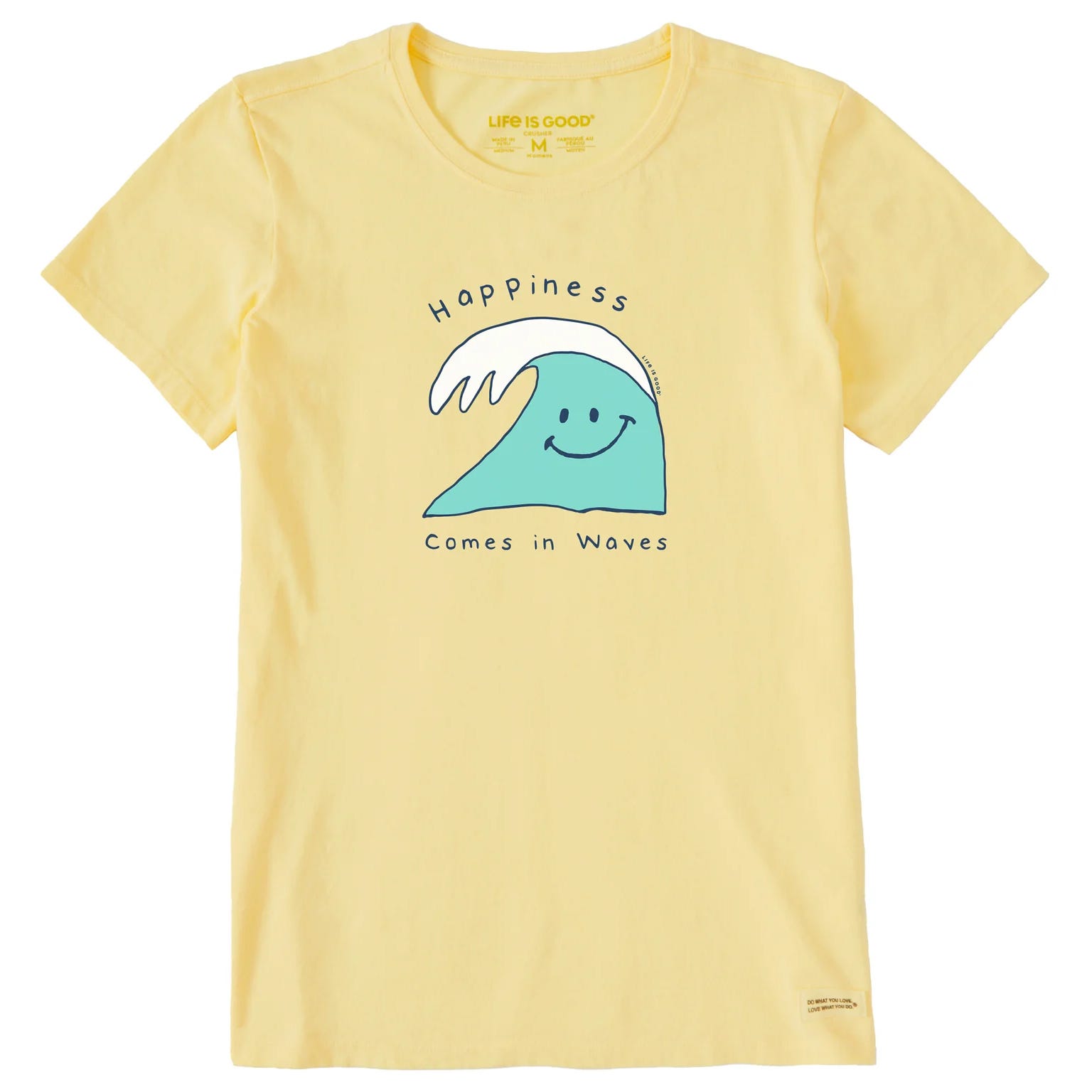 Yellow T-shirt featuring a smiling wave graphic with the text \“Happiness Comes in Waves.\“