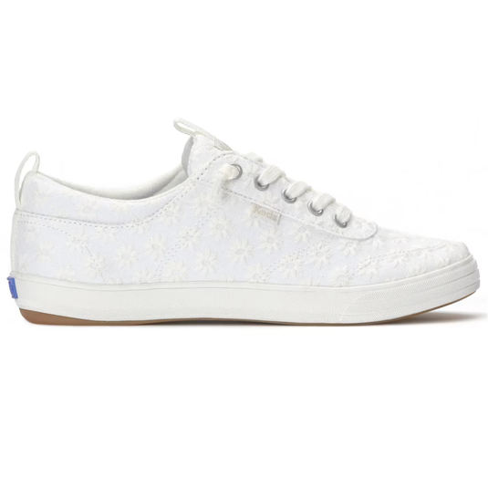 White low-top sneaker with floral lace overlay, featuring lace-up design and rubber sole.