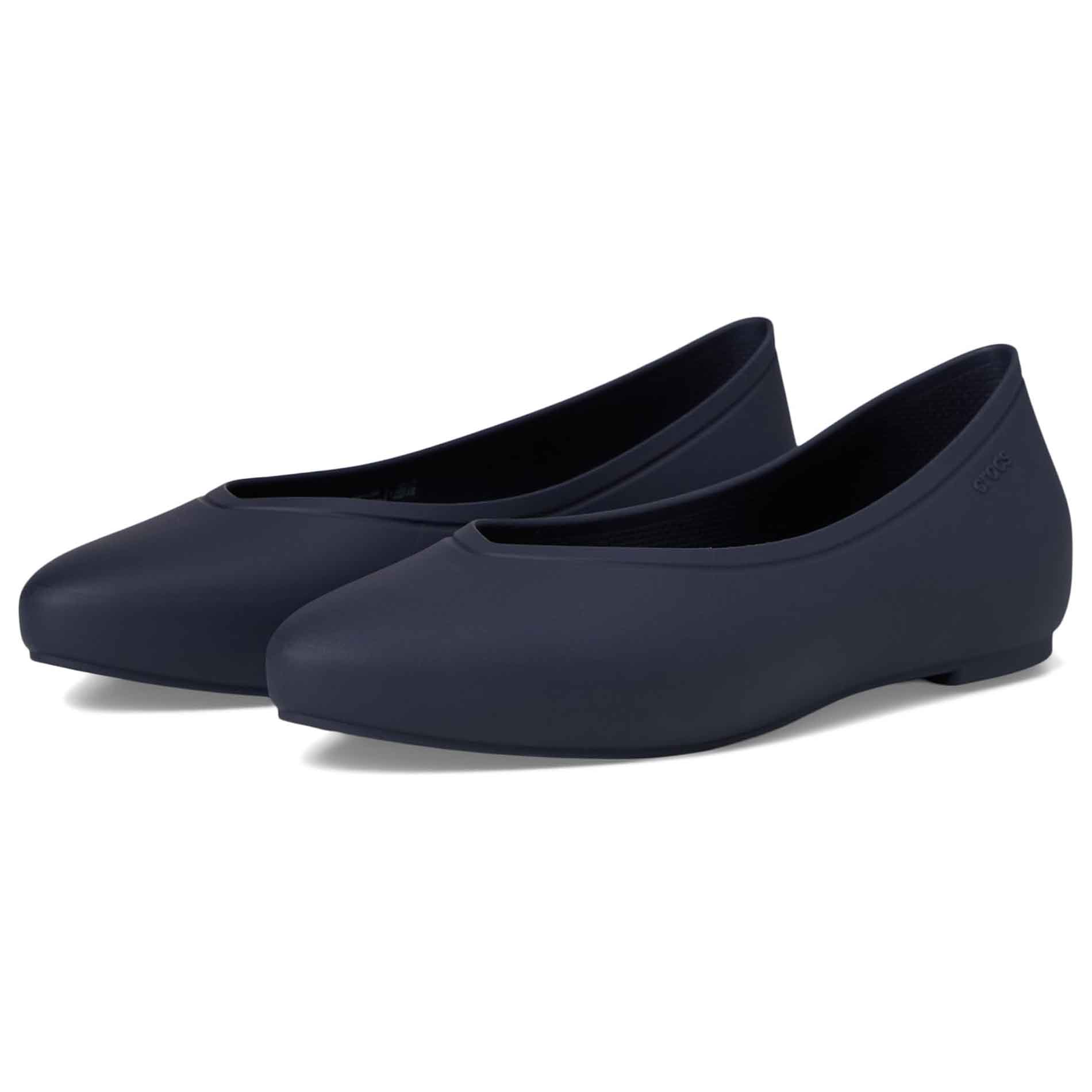 Navy blue pointed flats made by Crocs, featuring a sleek, minimalist design with a smooth finish. These slip-on shoes offer a comfortable fit and low profile for everyday wear.