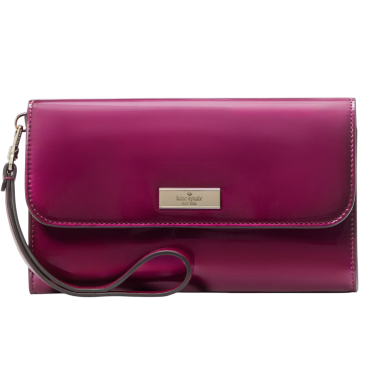 A glossy magenta clutch with a detachable wrist strap and a rectangular metal logo plaque on the front flap.