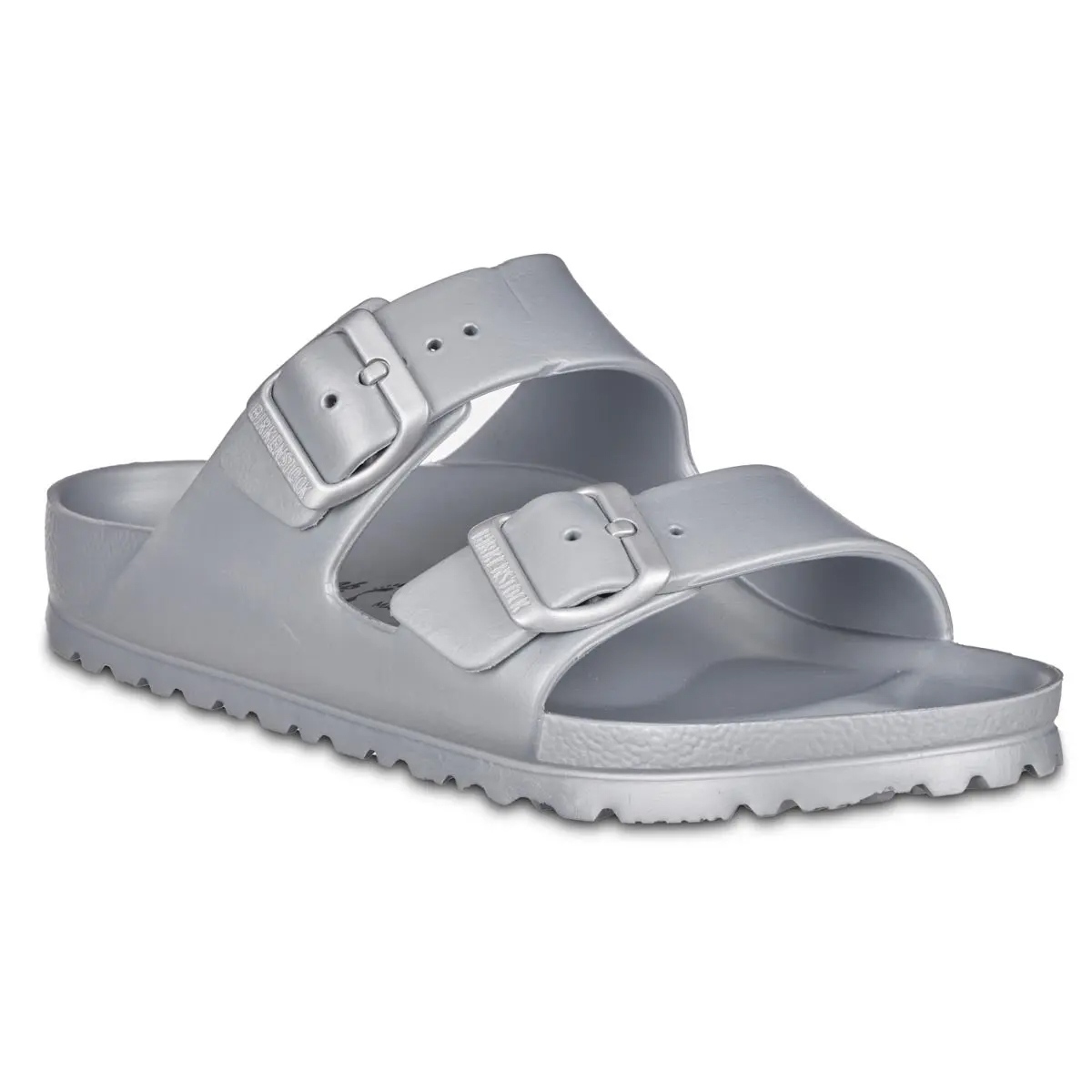Silver slide sandal featuring two adjustable buckles and a textured sole for grip.