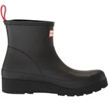 A black ankle-high rubber boot with a wedge heel and a red pull tab. It features a brand label on the side.