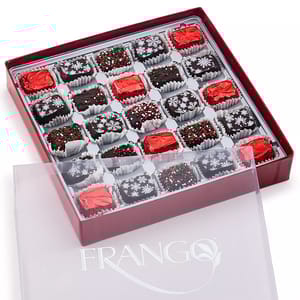 A box of Frango chocolates featuring a holiday-themed assortment with decorations like snowflakes and red-green sprinkles, packaged in a red and clear plastic box.