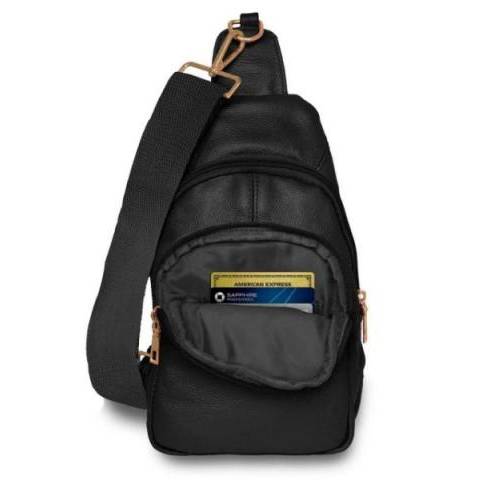 A small black leather crossbody sling bag with an adjustable strap and a zipped front pocket, containing a credit card.