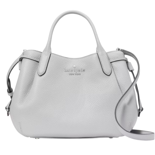 A light gray leather handbag from Kate Spade New York featuring top handles, a detachable shoulder strap, and a pebbled texture.