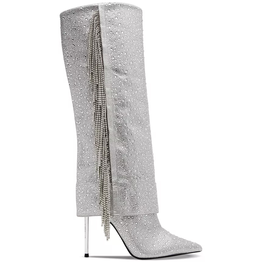 Steve Madden Rhinestone Stiletto Boots feature a pointed toe, silver rhinestone embellishments, a high stiletto heel, and dangling rhinestone chains along the side.