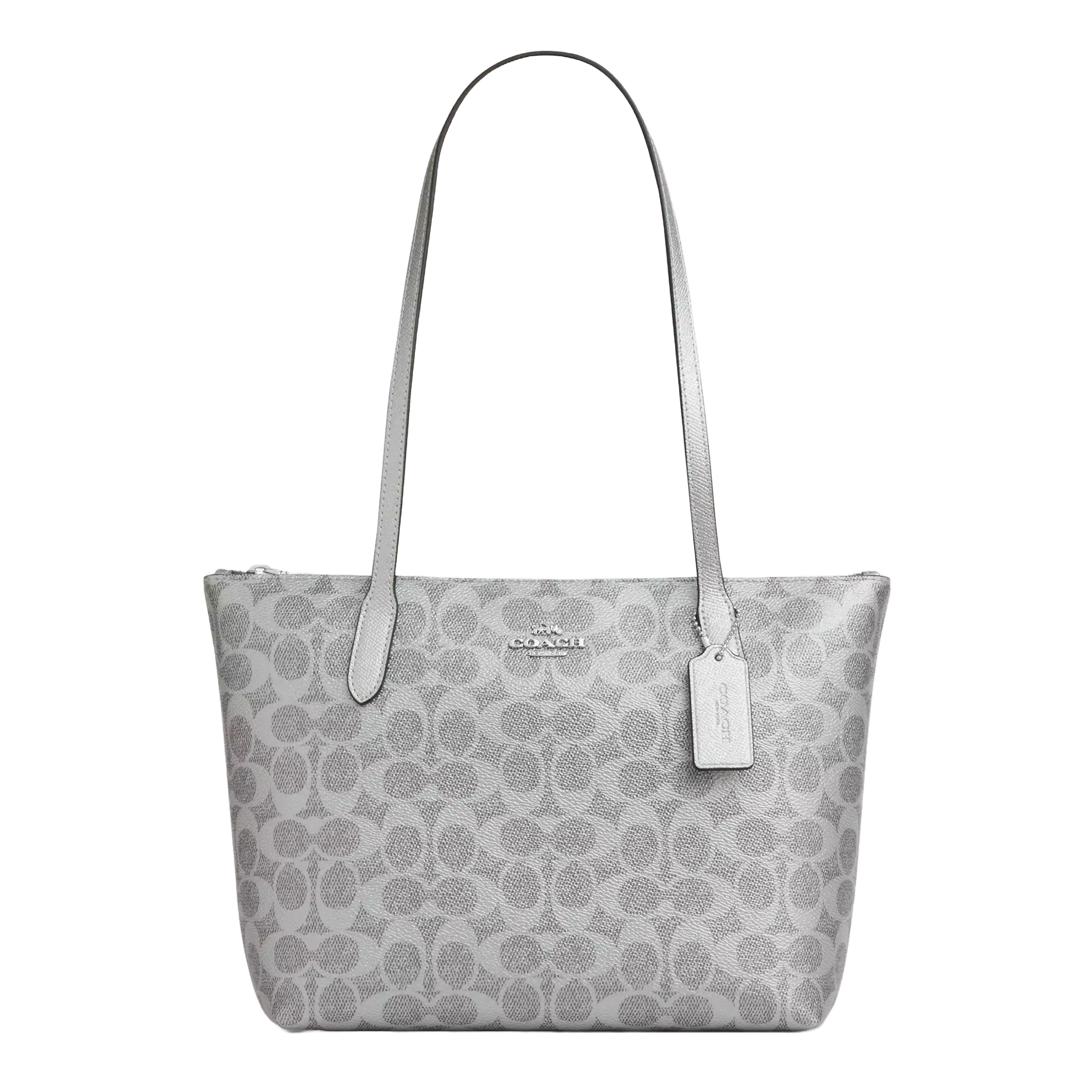 A gray Coach tote bag with the signature 'C' pattern, featuring long handles and a brand tag attached.
