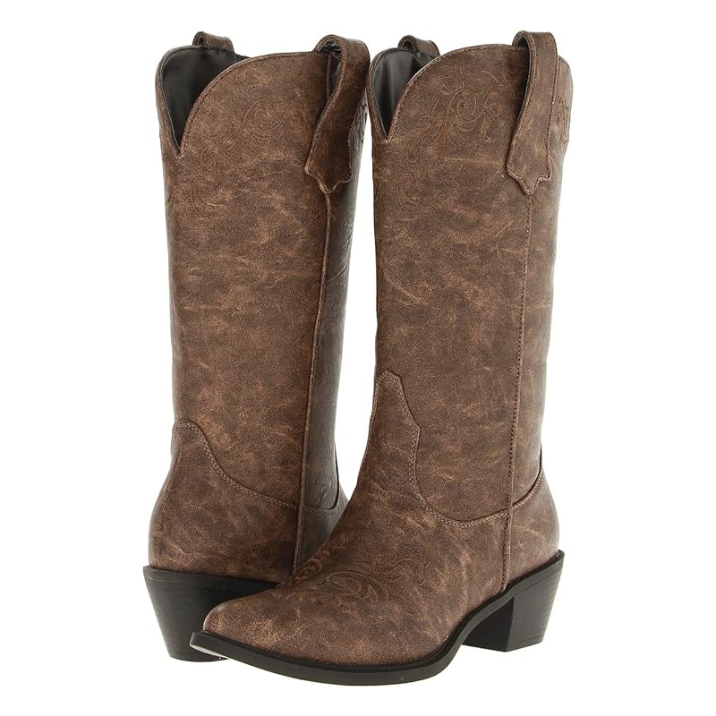 A pair of brown cowboy boots with decorative stitching.