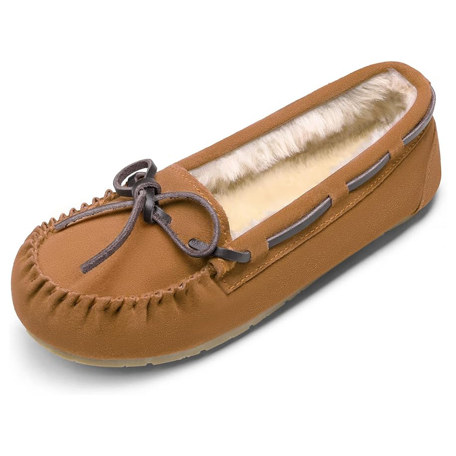 Brown suede leather moccasins with a cozy faux fur lining, featuring a stitched round toe and decorative laces on top.