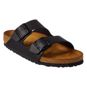 A black sandal with two adjustable straps and a cork footbed, commonly associated with casual comfort.