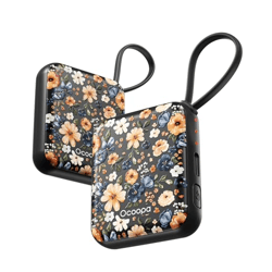 Two portable hand warmers with a floral design and looped handles.