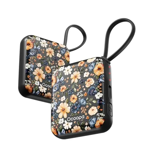 Two portable hand warmers with a floral design and looped handles.