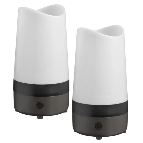 A pair of white and black electric diffusers with a sleek, modern design, featuring a power button on their base.