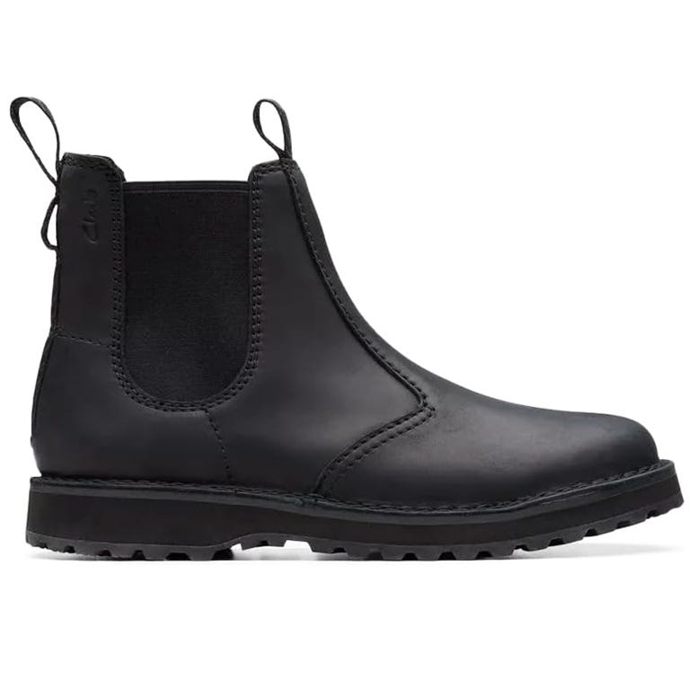 A black leather Chelsea boot with elastic side panels, a pull tab at the back, and a lugged sole for grip.