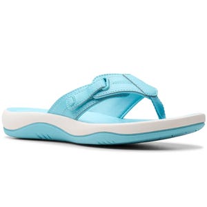 Light blue sandal with a simple thong design, featuring a strap with stitch detailing and a white contoured footbed for comfort.