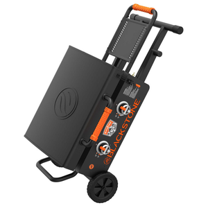 The Blackstone 22\“ Flexfold Griddle is a portable, foldable cooking appliance with a griddle surface, featuring an orange and black design, two adjustable heat dials, and a retractable handle with wheels for easy transport.
