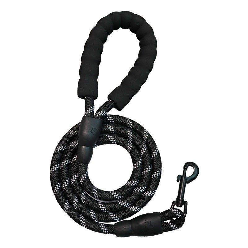 Black and white 5-foot reflective dog leash with a padded handle and metal clip for secure attachment.