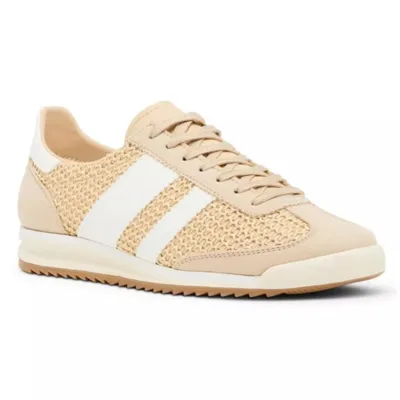 A beige sneaker with a woven texture, featuring white stripes on the side, a lace-up design, and a ridged sole for added traction.