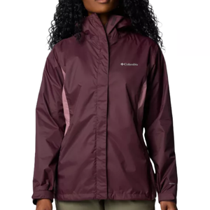The Columbia Arcadia II Jacket is a waterproof, hooded jacket in a burgundy color with a full front zipper and adjustable cuffs. It features the Columbia logo on the chest and is designed for protection against rain and wind.