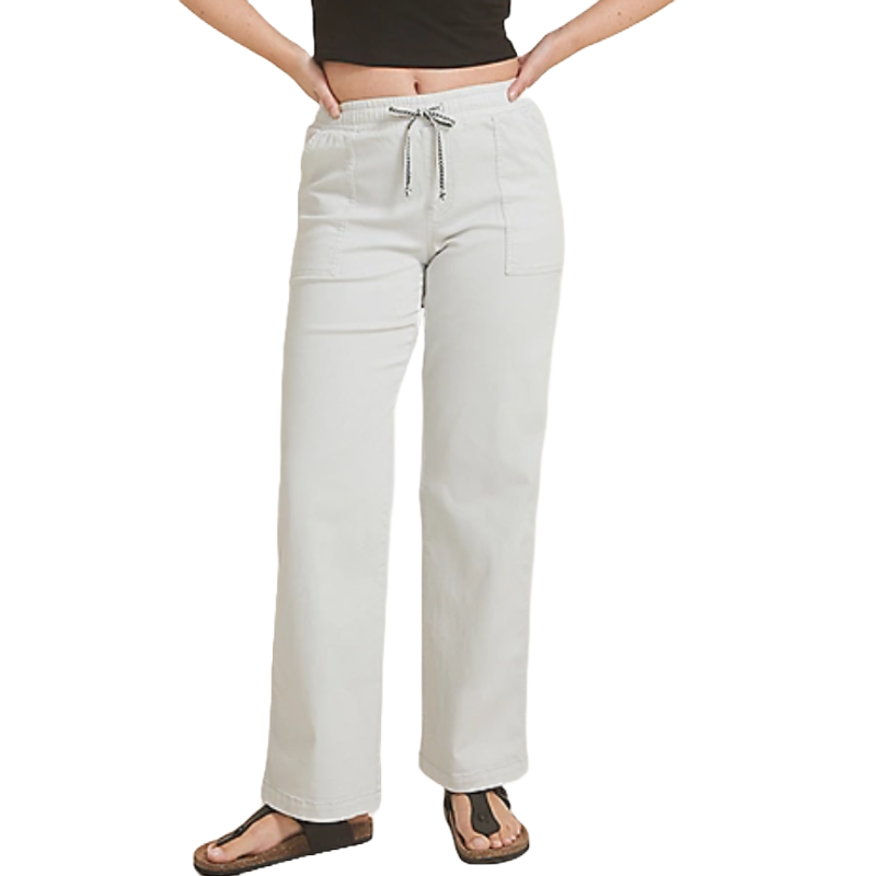 High-rise, wide-leg pants in a light color with an elastic waistband and drawstring, featuring large front pockets. Worn with sandals and a black crop top.