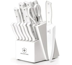 A 15-piece white knife set with a block, featuring various knives and kitchen scissors. The set includes knives for different purposes, all with matching white handles, and is branded with the name \“BRAVESTONE\“ on the block.