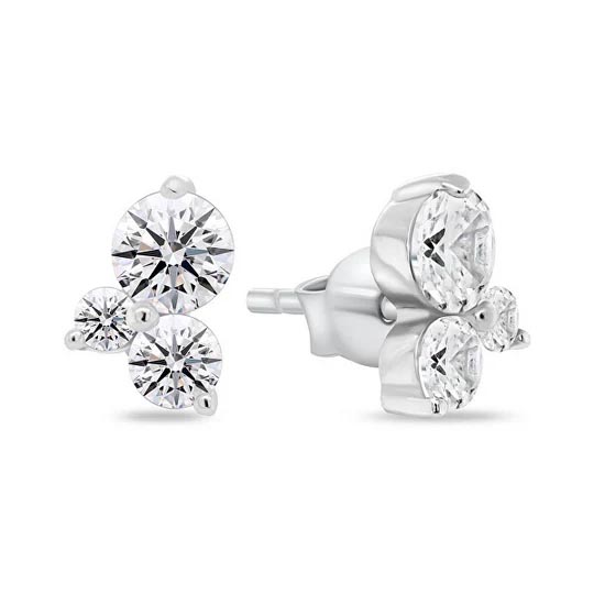 Pair of stud earrings with three round, white gemstones set in a triangular formation on a metal base.