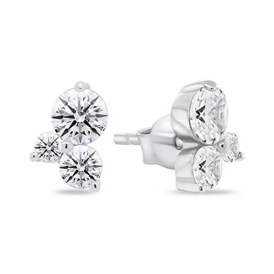 Pair of stud earrings with three round, white gemstones set in a triangular formation on a metal base.
