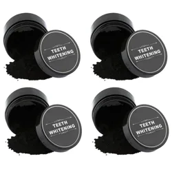 Four containers of black teeth whitening powder, each labeled \“TEETH WHITENING,\“ with some powder spilled beside each open container.