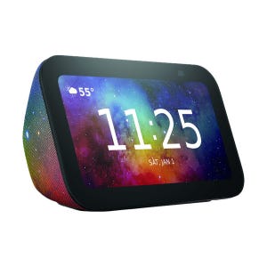 A smart display designed for kids, with a colorful back, showing a time display, date, and weather at 55°F.