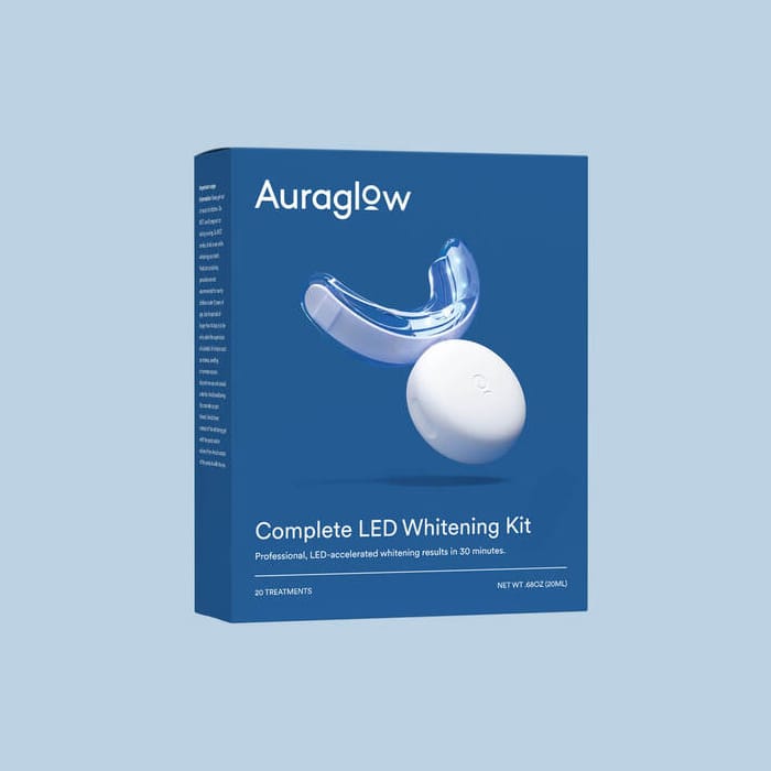 Auraglow Complete LED Whitening Kit with a mouthpiece and a LED light device.