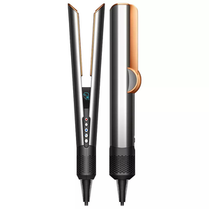 A dual-purpose hair styling tool featuring two views: an open flat iron with adjustable temperature settings and a closed cylindrical design, likely for curling. The device combines metallic and copper tones with a digital display and corded power.