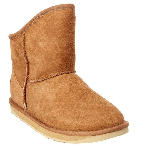 Tan suede boot with a flat sole and mid-calf height, featuring visible stitching and a plush inner lining.