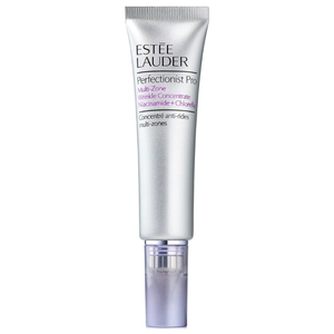 Estée Lauder's Perfectionist Pro is a multi-zone wrinkle concentrate featuring niacinamide and chlorella, designed to target wrinkles. The packaging is a sleek, silver tube with a purple cap.